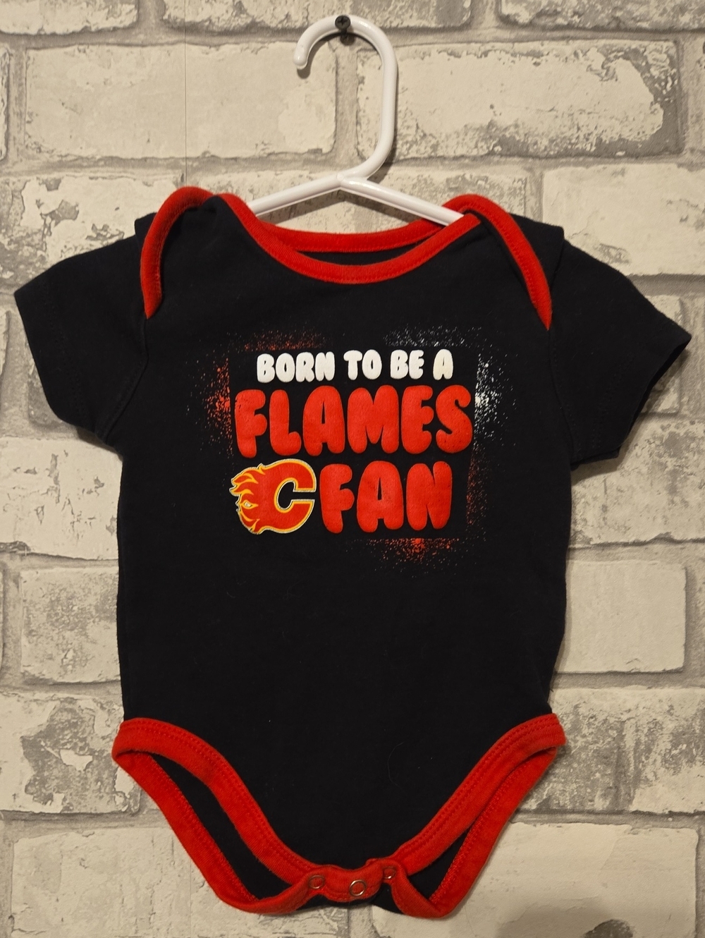 NHL Black and Red "Born to Be a Flames Fan" Baby One-Piece